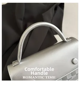 Macro view of a comfortable silver handbag handle with fine stitching and quilted patterns