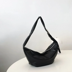 Minimalist black crescent hobo bag in premium PU leather with silver metal zipper