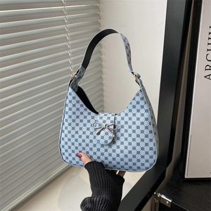 Chic light blue crescent hobo bag featuring geometric print and silver bow buckle