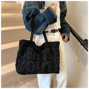 Grande borsa tote in denim nero con scritta Gentle Youth per il tempo libero e ufficio