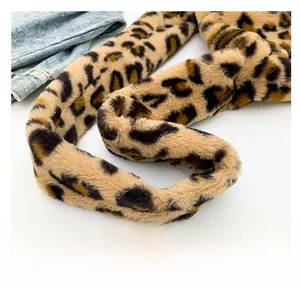 Detail of leopard print plush shoulder strap with soft faux fur texture and pattern