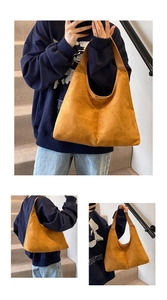 Detailopname van de vintage matte leren hobo-tas in een warme karamelbruine kleur