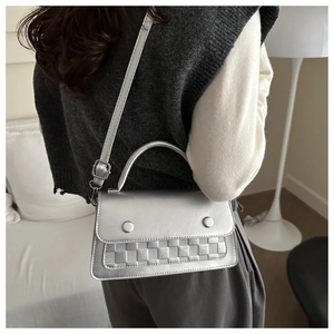 Silver rectangle crossbody bag with woven checkerboard flap and wide strap