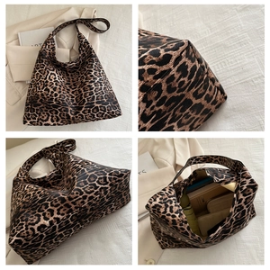 Detail showing the large interior capacity of this leopard print canvas tote bag