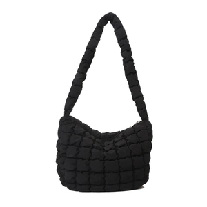 Modern black quilted dumpling shoulder bag with textured square pattern on white background