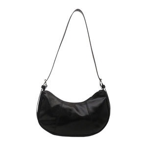 Glossy black crescent hobo shoulder bag with silver hardware and smooth leather finish