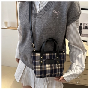 Classic navy and beige plaid crossbody bag styled with preppy outfit for daily look