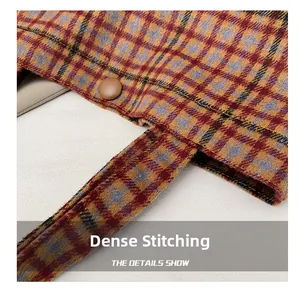 Close-up of tight stitching and vintage plaid fabric texture on the shoulder tote bag