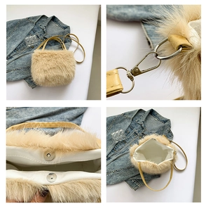 Detailweergave van beige pluche tas met lederen handvatten en magneetsluitingen