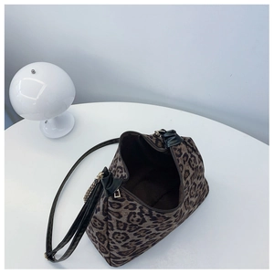 Top view of open leopard print shoulder bag showing large interior space and zipper