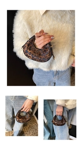 Detailed view of mini leopard print crescent bag with elegant gold hardware accents