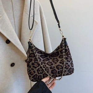 Vintage leopard print hobo shoulder bag with gold chain and black leather strap