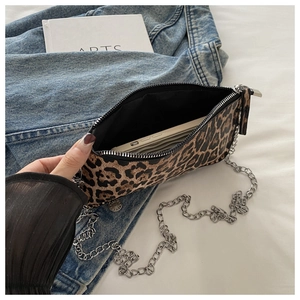 Flat leopard print bag with silver chain strap shown holding a smartphone