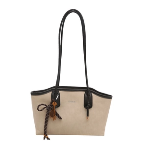 Vintage beige tote bag with black straps and fashion lettering on white background