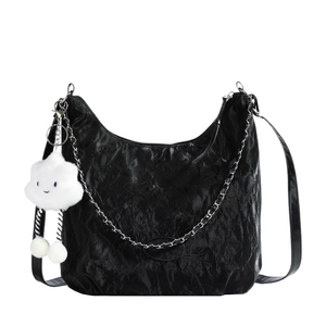 Black crinkled hobo bag with silver chain and white cloud charm for casual daily commute