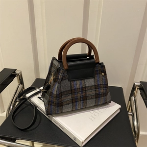 Chic plaid woolen handbag with round resin handle and detachable black leather strap