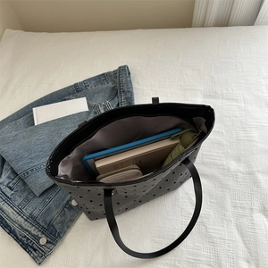 Grey star pattern canvas tote bag showing spacious interior with tablet and books