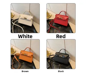 Close-up of crocodile textured square bags in white red brown and black colors