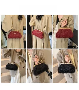 Chic burgundy and black faux fur evening clutch with gold metal handle and chain strap