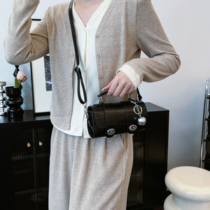 Black crocodile-pattern cylinder handbag with silver sphere charm and metal clasp