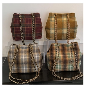 Detailed grid showing four colors of plaid wool tote bags with golden chain straps