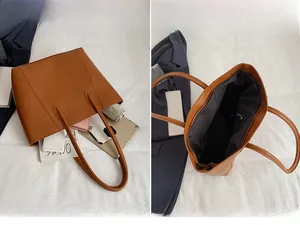Brown faux leather tote bag interior showing capacity for iPad and daily essentials