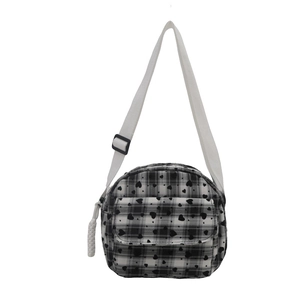 Classic black and white checkered crossbody bag with heart patterns and adjustable strap