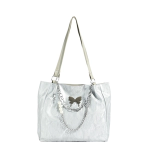Metallic silver tote bag with butterfly emblem and pearl chain decoration