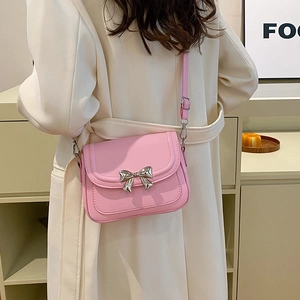 Chic pink bow mini crossbody bag for women with elegant silver metal bow clasp decoration