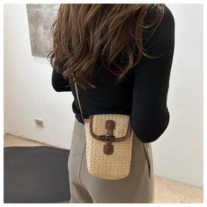 Vertical straw woven phone bag with vintage wooden horn buckle and brown leather strap