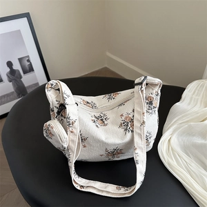 Floral corduroy hobo bag in cream with retro orange flowers and matching coin purse