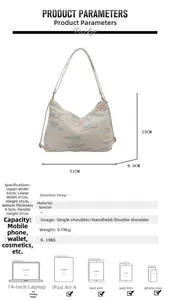 Size guide for large tote bag showing 32cm width and various item storage compatibility