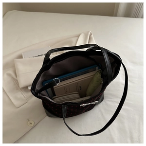 Spacious tote bag with heart print showing internal storage for tablet and essentials