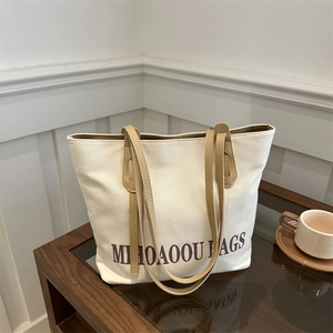 Minimalistische beige Canvas-Tote-Tasche mit braunen Lederriemen für Beruf und Freizeit