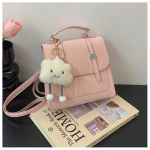 Pink marble-textured backpack with a cute cloud charm and vertical strap detail
