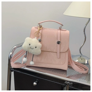 Pink glossy versatile backpack with silver metal buckles and a cute plush cloud charm