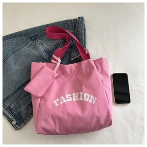Sac cabas rose en toile avec inscription FASHION et petite pochette assortie