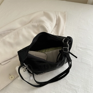 Large capacity black nylon crossbody bag with silver chain strap and bear charm