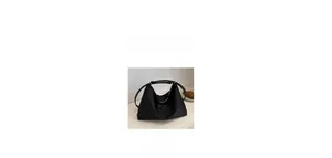 Detail of black nylon tote bag with metal triangle plaque and matching accessories
