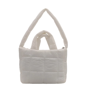 White puffer tote bag with quilted square patterns and comfortable shoulder straps