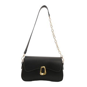 Classic black leather underarm shoulder bag with irregular gold metal buckle and chain strap