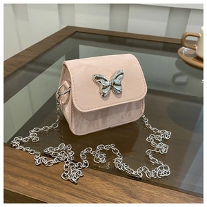 Close-up of pink marble texture bag with silver butterfly buckle and chain strap