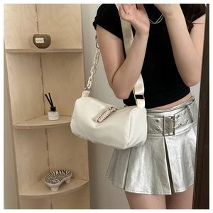 White nylon cylinder shoulder bag with trendy acrylic chain and wide fabric strap