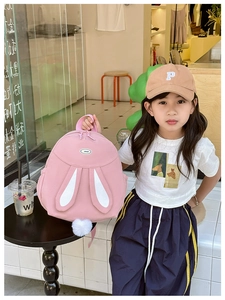Pink rabbit-themed backpack with cute white plush tail and soft long ears for kids