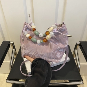 Elegant lavender bucket bag with marble pattern and colorful beaded handle for women