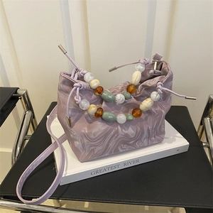Elegant purple marble pattern bucket bag with colorful bead handle and drawstring closure