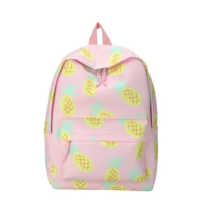 Close-up of pink backpack with yellow pineapple prints and durable metal zippers