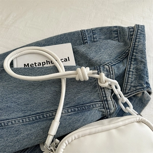 White minimalist PU leather shoulder bag with decorative chunky chain and knot strap detail