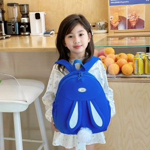 Cute blue rabbit backpack for school girls with long ears and soft pom-pom detail