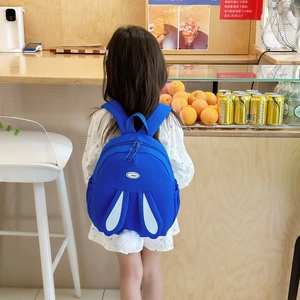Cute royal blue bunny ears backpack for girls with soft plush tail on back view